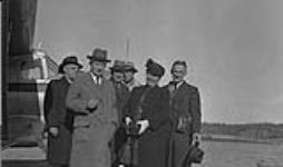 Hon. J.A. Glen and party at aeroplane wharf August 1946.