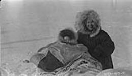 Tommy's wife and baby at Harrison Bay, N. Coast of Alaska Marh 1927.