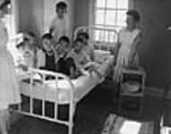 [Dene children in hospital] Original title: Indian children in hospital 1945