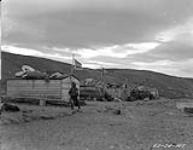[Looking south showing housesof Inuit on Baffin Island] Original title: Looking south showing houses of natives on Baffin Island 1924