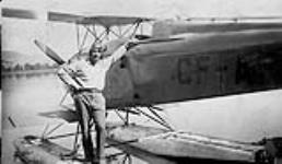 Russ Baker with a de Havilland DH-83 "Fox Moth" aircraft 1937