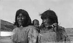Unidentified Inuit women and child 1928