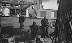 Mr. Valiquette, Mr. Rivet, Mr. Tellier on deck load 1923