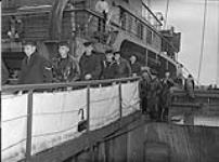 Ratings of the Royal Navy arriving to man former U.S.N. destroyers 7 Sept. 1940