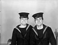 Ordinary Seamen R.C. Reeves (left) and R.D. Nelson, both Anti-Aircraft Ratings Third Class, Royal Canadian Navy Gunnery School, H.M.C.S. CORNWALLIS, Halifax, Nova Scotia, Canada, 15 January 1943 January 15, 1943.
