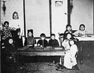 Mrs. Patrick's mission to the Japanese in Kitsilano, showing Japanese and Native Indian children attending 1909