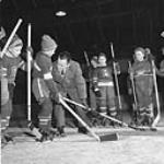 Future hockey stars are instructed in proper method of body checking in Arnprior, Ont., January 1956 Jan. 1956
