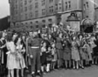 Crowd at the Victory Loan Indicator, Confederation Square, on V-E Day May 1945