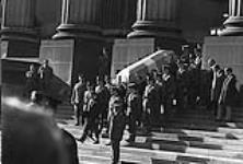 [Hon. Pierre] Laporte's [coffin] leaving the Court House, [Montreal, Que.], 20 October 1970 October 20, 1970.