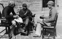 Meeting between Dr. Norman Bethune (left) and Nieh Jung-Chen (centre), Commander-in-Chief of the Chin-Ch'a-Chi Border Region 1938