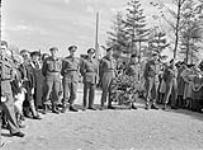 Personnel of the Algonquin Regiment and the Governor General's Foot Guards (GGFG) at unveiling of monument dedicated to Canadian troops killed in action, Moerstraaten, Netherlands, 26 August 1945 August 26, 1945.