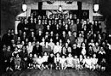 [Group of Okinawan Canadians at Coaldale, Hall, Coaldale, Alta.] [1948]