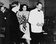 Viscount Alexander of Tunis, Governor General of Canada, and Viscountess Alexander at the opening night of "While the Sun Shines", by Terence Rattigan, The Stage Society. At left: Hugh Parker, director; in background: Jack Ammon, actor 8 July 1948