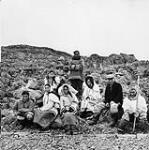 Inuit artists of Cape Dorset cooperative. (L-R),top row: Nepachee, Pudlo; bottom row: Eejyvudluk, Kenojuak, Kiakshuk, Lucy, Pitseolak, Parr Aug. 1961