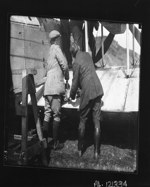 Capt. John Alcock (left?) preparing Vickers "Vimy" aircraft prior to trans-Alantic flight, Lester's Field June 1919