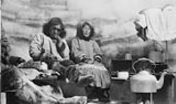 [Neokak and his wife inside igloo. Unknown, N.W.T.? Nunavut?] [ca. 1940-1944].