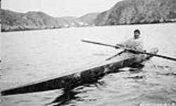 An Inuit man in a kayak 1929.
