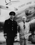 Captain Sheldon Luck with Mr. Robert Service in front of Barkley - Grow T8P-1 aircraft CF-BMG 'Yukon King' of Yukon Southern Air Transport Ltd ca 1941