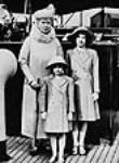 H.R.H. Queen Mary touring London's dockyard area with Princesses Elizabeth and Margaret Rose May 1939