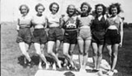 Members of a Canadian variety vaudeville troupe reheasing at the Fairmont Country Club; L-R: Florence Petrie, Margaret Davidson, Wynne Strachan, Chrissie Young, Kay ---, Lillian Strachan & Velma McMahon 1939