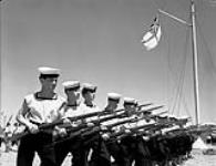 Naval recruits with fixed bayonets, H.M.C.S. CORNWALLIS, Deep Brook, Nova Scotia, Canada, June 1943 June 1943.