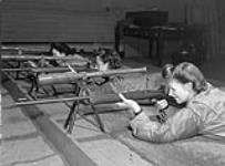 Personnel of the Canadian Women's Army Corps (C.W.A.C.) at a Firing Range December 15, 1944.