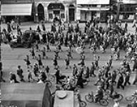 Canadian Women's Army Corps (C.W.A.C.) Pipe Band parading through Amsterdam, Netherlands, 17 October 1945 October 17, 1945.