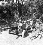 Gunners of the 7th Anti-Tank Regiment, Royal Canadian Artillery (R.C.A.), manning a six-pounder anti-tank gun during a training exercise, Petworth, England, 10 September 1942 September 10, 1942.