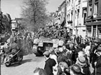 Crowd welcoming The Stormont, Dundas and Glengarry Highlanders to Leeuwarden, Netherlands, 16 April 1945 April 16, 1945.