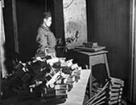 Trooper L.R. Stoutenberg of The Fort Garry Horse painting toys which will be given to children on St. Nicholas Day. Doetinchem, Netherlands, 22 November 1945 November 22, 1945.