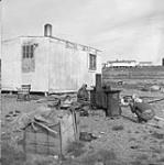 Outdoor Camp of [Arnasuagnark] at Baker Lake, N.W.T. [between 1962-1969].