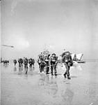 Unidentified Canadian soldiers landing on Juno Beach, Courseulles-sur-Mer, France, 6 June 1944 June 6, 1944.