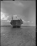 H.M.C.S. WARRIOR run aground, head on view taken from shore, 14:00 hours 23 Aug. 1946