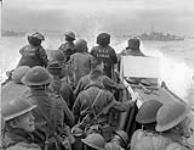 Infantrymen in a Landing Craft Assault (LCA) going ashore from H.M.C.S. PRINCE HENRY off the Normandy beachhead, France, 6 June 1944 June 6, 1944.