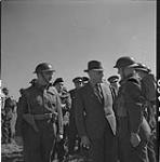 Hon. J.L. Ralston, Minister of National Defense, inspecting troops of 5 Division 30 July 1943
