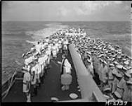 Stoker Phillips funeral at sea, HMCS UGANDA 27 Apr. 1945