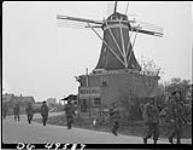 Infantry of the Regiment de Maisonneuve moving through Holten to Rijssen, both towns in the Netherlands 9 Apr. 1945