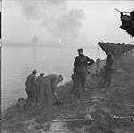 German prisoners at work on the banks of the Ijssel River 11 Apr. 1945