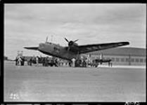 Three quarters part view of Harrow aircraft on tarmac at RCAF Station Gander for England 19 Aug. 1941