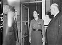 Visit of Hon. J.L. Ralston to No.5 Canadian General Hospital, R.C.A.M.C.. (Left to right): Lt. Gen. H.D.G. Crerar, Col. B.C. Leech, Canadian Red Cross Worker Barbara Ross, Col. Ralston 30 Nov 1943
