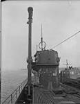 View looking aft showing Schnorkel of German submarine U-889 in raised position 25 May 1945