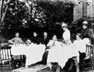 Group having tea at 54 Main Street, residence of James Ballantyne. May Ballantyne is seated at extreme right and Adam Ballantyne is seated third from left. The others are unidentified 20 June 1895