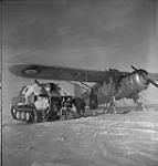 Gassing up a Penguin snowmobile from Norseman aircraft - Operation Musk-Ox 17 Mar. 1946