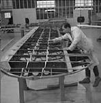 Technician restoring aircraft wing, National Aviation Museum 18 Sept. 1965