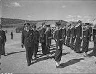 A/Captain P.B. German inspecting personnel during Sunday Divisions at H. M.C.S. FORT RAMSAY June 1943