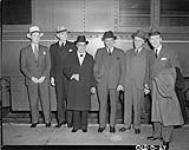 Mr. Arnold Heeney, Col. K.S. Maclachlan, Rear-Admiral Percy Walker Nelles, Colonels Power and J.L. Ralston and Hon. Angus MacDonald, Minister of National Defence for Naval Services 1940