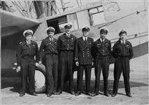 R.C.N. personnel and R.N. instructors with Supermarine 'Sea Otter' II aircraft. Canadians are Sub-Lts. John Lawrie (2nd from left), Irv Bowman (5th from left), Art Bray (6th from left) 1945