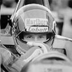 Gilles Villeneuve awaits the start of practice for the U.S. Grand Prix 1979.