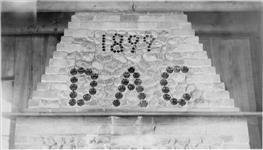 "D.A.C. 1899", over fireplace at Denholm Angling Club c. 1910