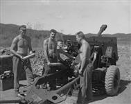 A gun crew of the Royal Canadian Horse Artillery prepares to fire 14 Ot. 1951